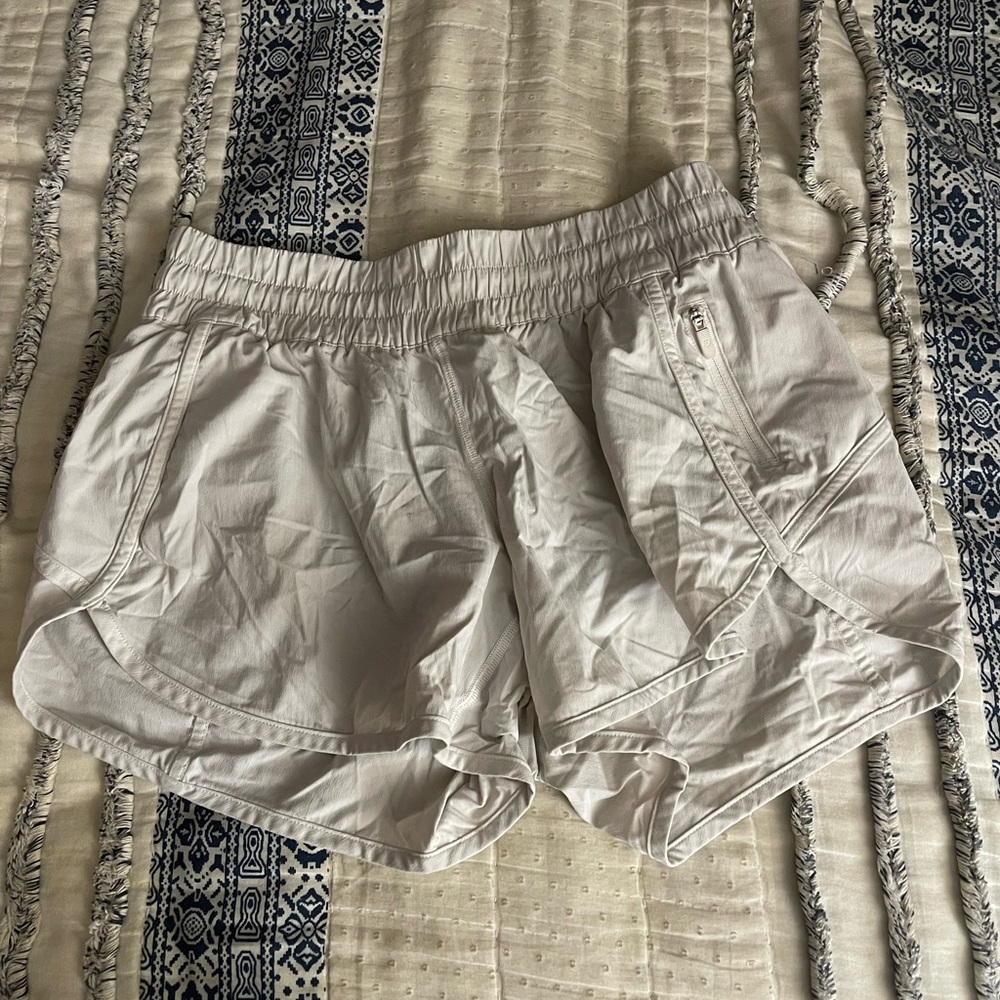 white lulu tracker shorts 4”